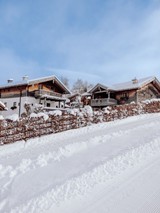 Chalet village along winter trail, Puradies Leogang