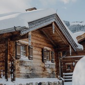 Snow-covered chalet in winter, Puradies Leogang