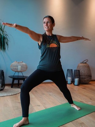 Yoga Instructor Sabrina Practicing Yoga, Naturresort Puradies, Leogang, Salzburger Land Yoga instructor Sabrina practicing yoga with outstretched arms, Puradies Leogang