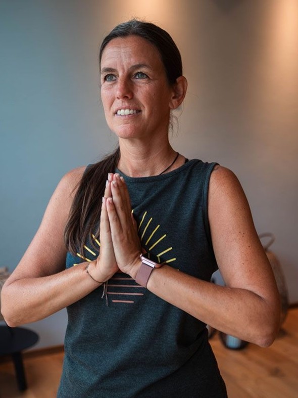 Yoga Instructor Sabrina in Meditative Pose, Naturresort Puradies, Leogang, Salzburger Land Yoga instructor Sabrina in meditation pose, Puradies Leogang